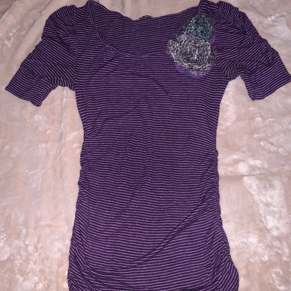 Small purple floral accent top